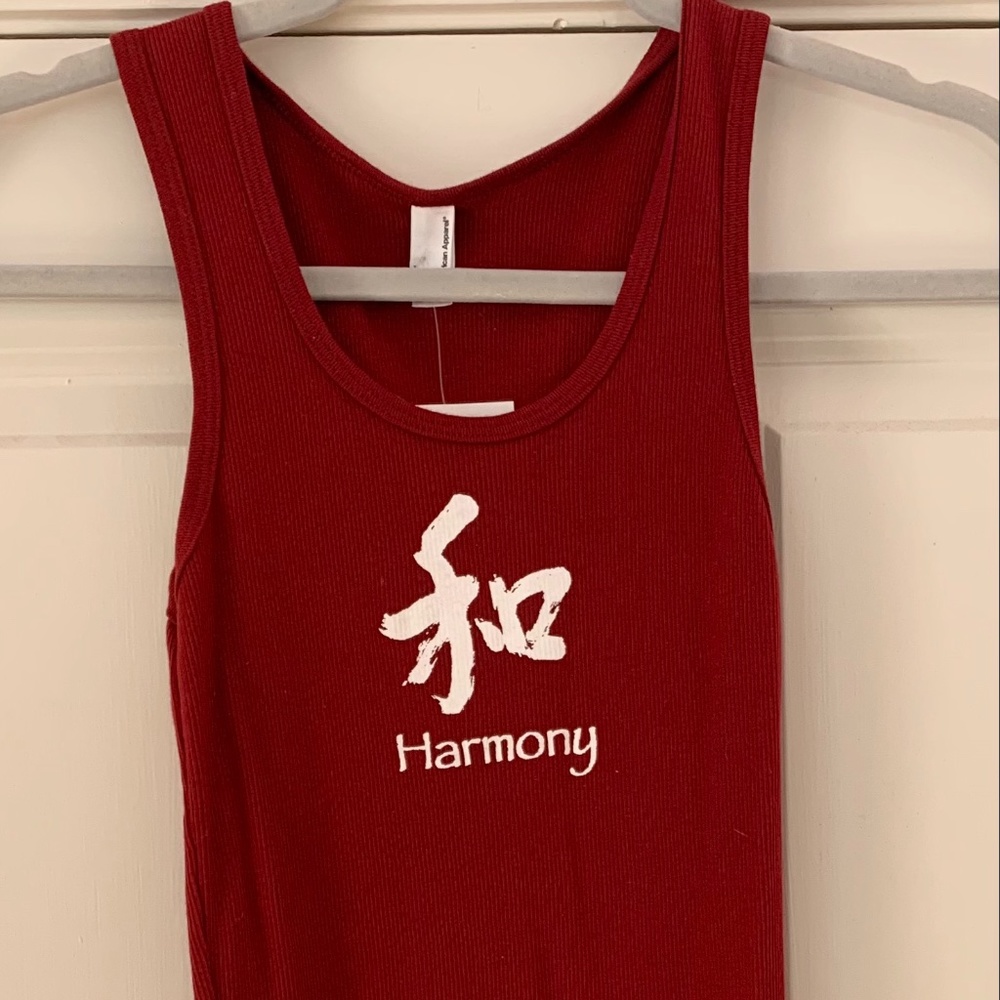 sleeveless ribbed tank top with "harmony" logo